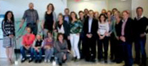 A photo of College Chair Angela De Palma standing with a large delegation of teachers from the Netherlands.