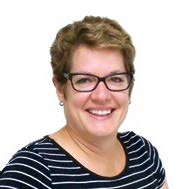 A portrait photo of Sylvie Forest Palkovits, Ontario Certified Teacher. Sylvie is smiling.