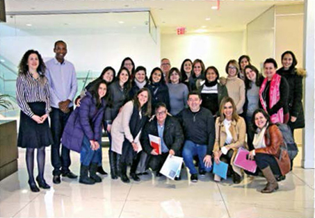 Photo of an international delegations of educators from Brazil pictured with College Chair Angela De Palma.