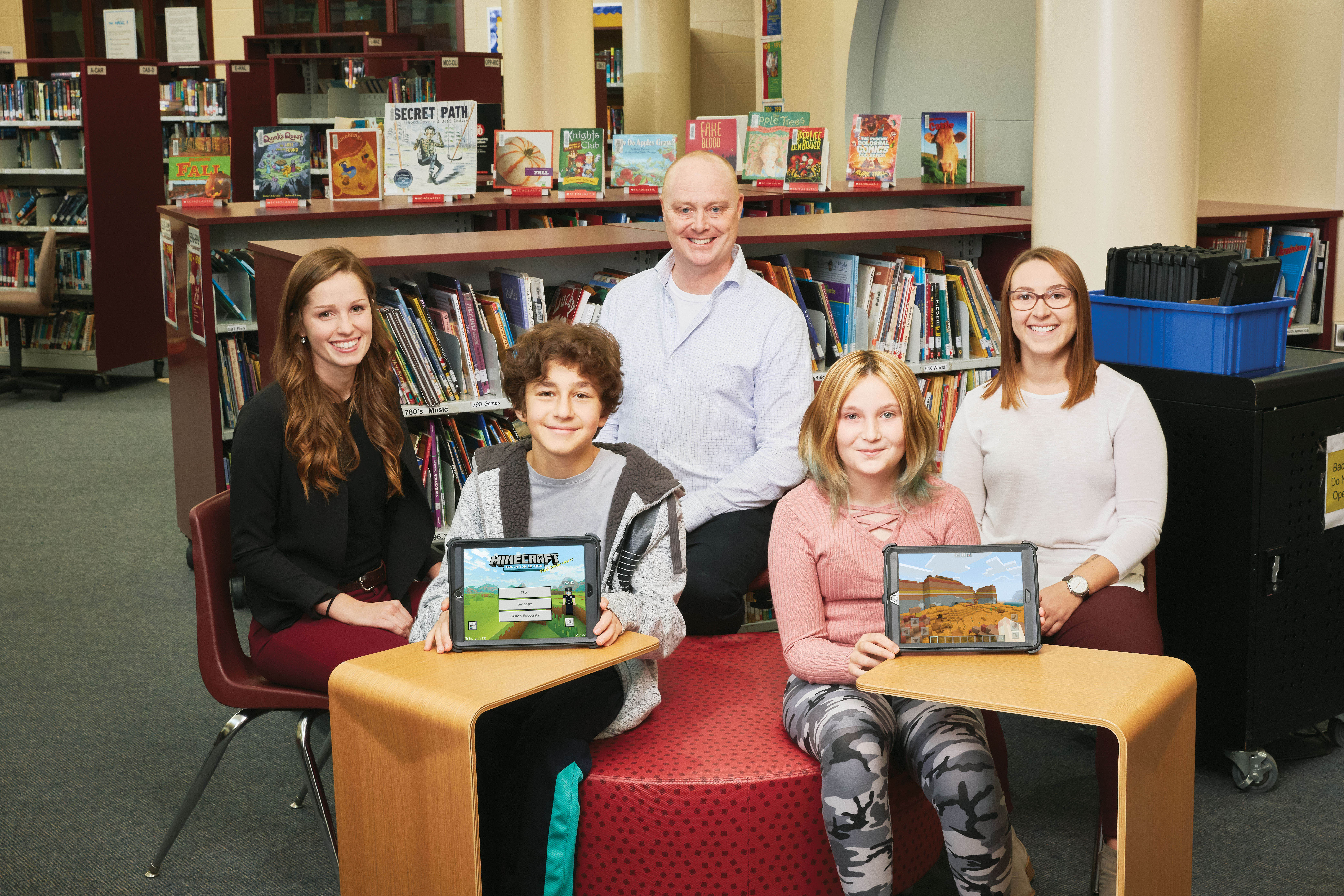 Photo of Lauren Sovereign, OCT, David Carruthers, OCT, and Mariah Gooding, OCT, and students.