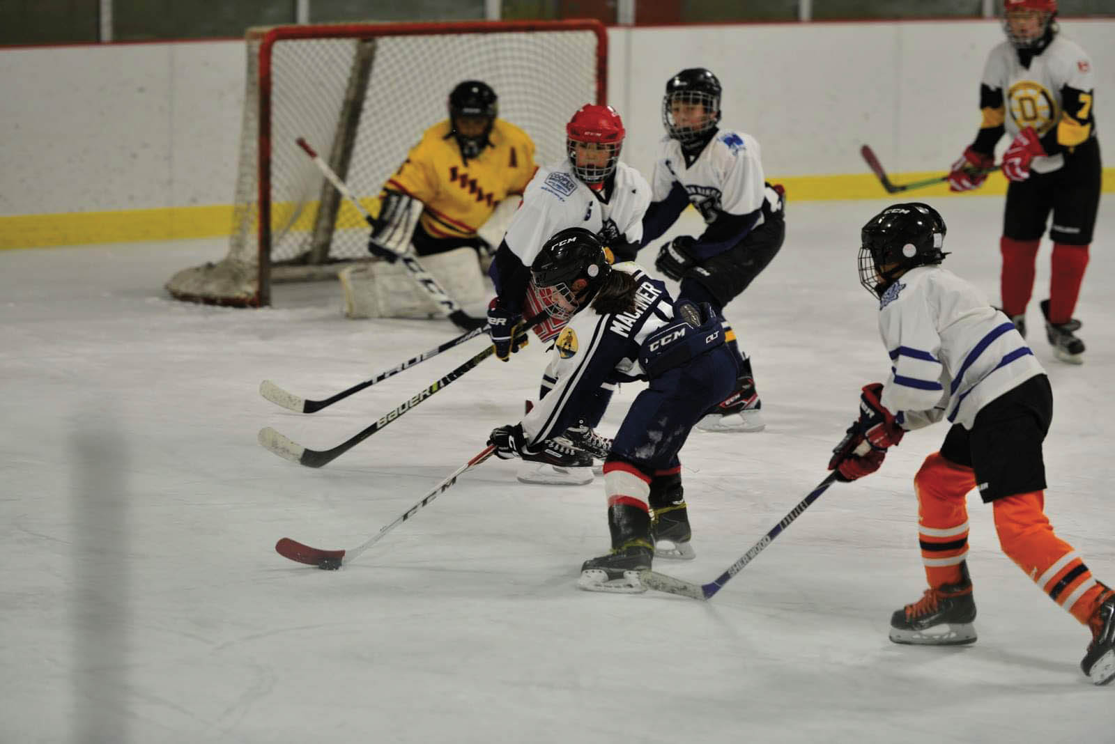 Youth playing hockey