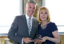 A photo of College Registrar and CEO Michael Salvatori, receiving the 'InspirED'. award. t