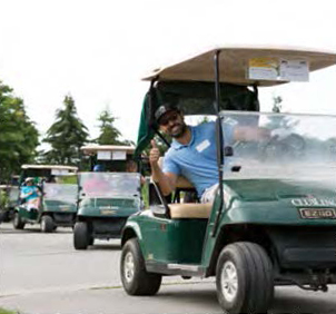 A golfer putting on a green
