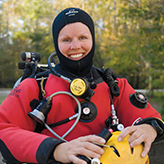 Photo of Jill Heinerth, cave diver, wearing a diving suit.