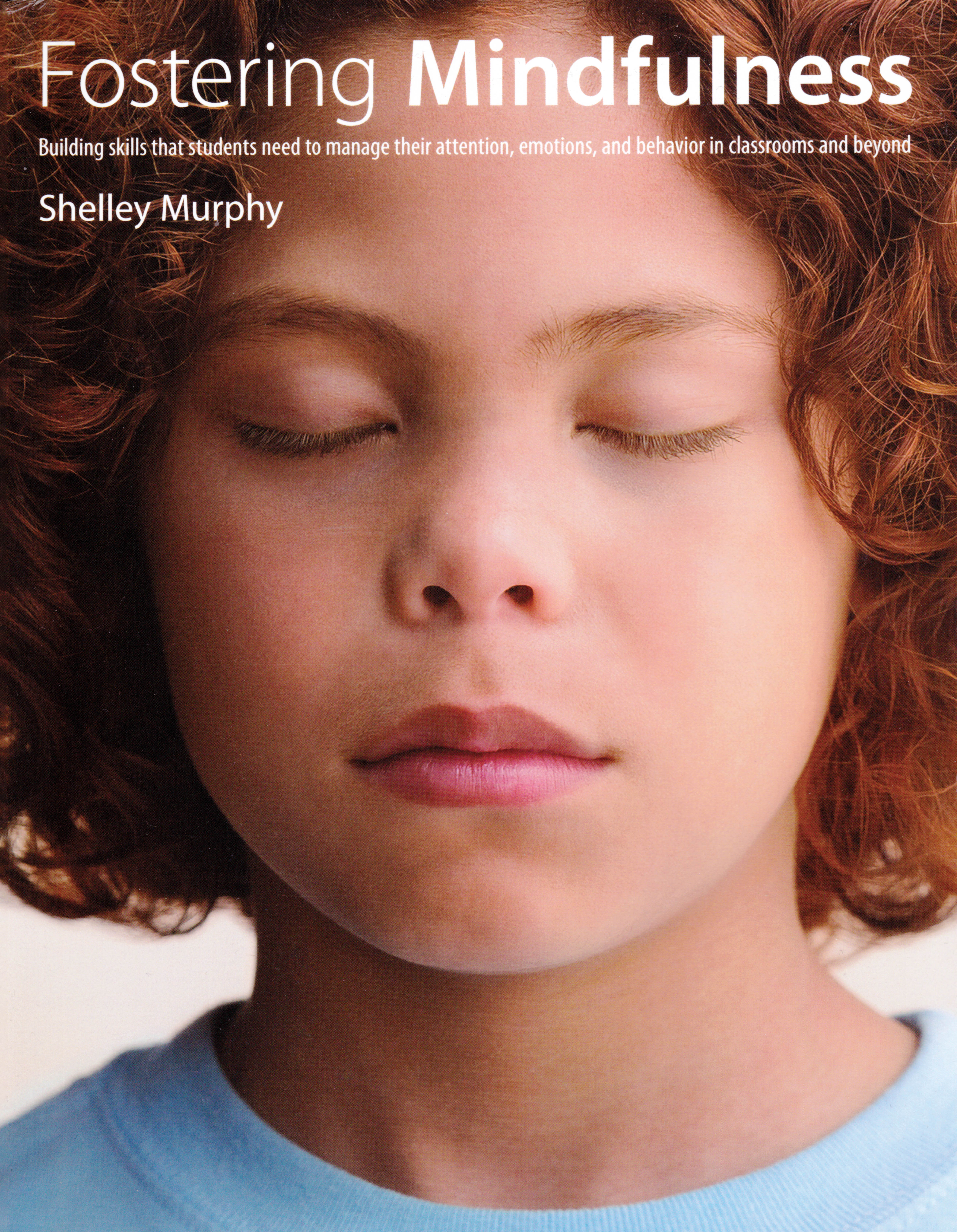 Photo of a book cover of 'Fostering Mindfulness.' The cover is a person's face with their eyes closed.

